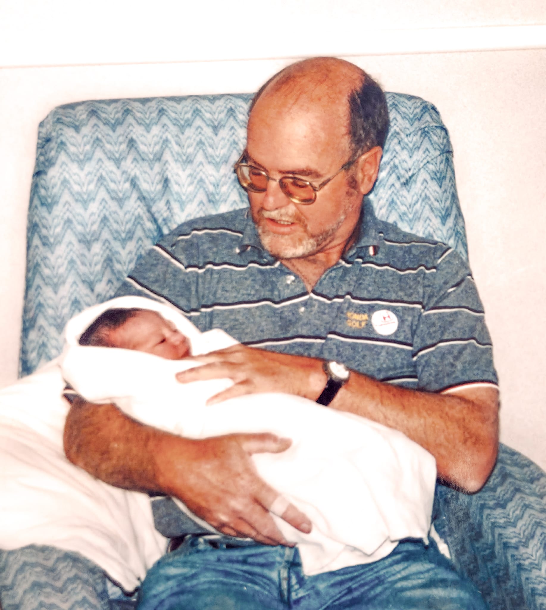 First time holding his first grandbaby