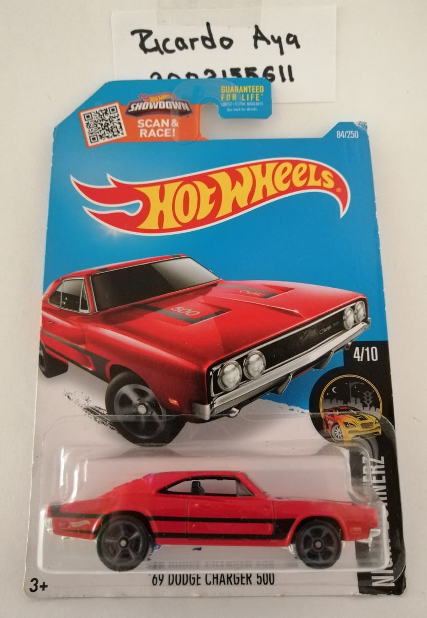 Front of satchel with blue canvas body, black straps and handle, drawstring top, and front zipper pouch.