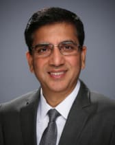 Roger Sharma, President & CEO