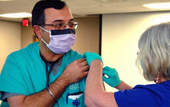 Lake Regional Pulmonologist Harjyot “Joe” Sohal, M.D., was the first Lake Regional employee to receive the COVID-19 vaccine. Dr. Sohal cares for COVID-19 patients in Lake Regional’s Intensive Care Unit.