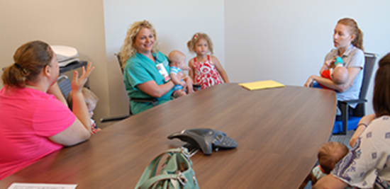 Annie Havner, center, Lake Regional's lactation consultant, encourages breast-feeding moms to find support from their peers.