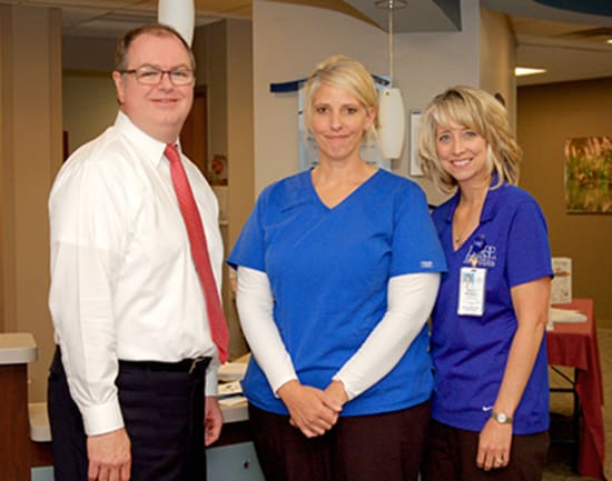 2) Angel Frisbie, R.N., winner of the Beacon of Patient-Centered Care, with Kevin McRoberts, senior vice president of operations, and Marcy Maxwell, Lake Regional Cancer Center director.