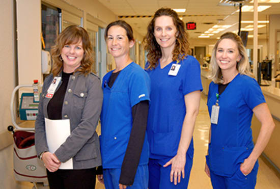 Jennifer Wiethop, R.N., receives the Mentorship award from Hunter, Kempf and Whitcomb.