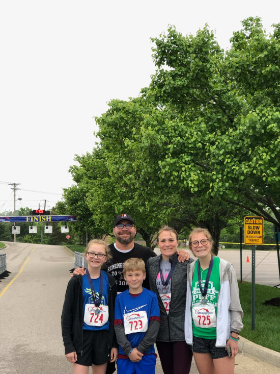 The Fowler family celebrates at the Lake Regional Fun Run/Walk finish line in 2019. Shawn Fowler graduated from Lake Regional Cardiopulmonary Rehab following a heart attack at age 42.
