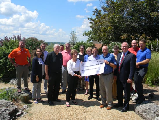 The HK’s committee, led by Peter and Susan Brown, present a check for $171,032 to Lake Regional Health System.