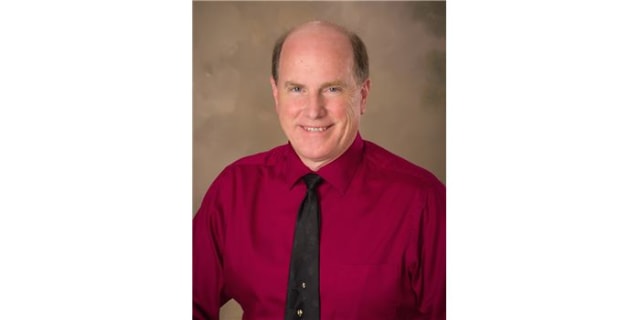 John C. Nicholson, MD