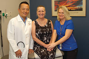 “You have to have a positive outlook,” Dzurko said. “At first it’s scary, but then you meet your doctor and your nurses, and they encourage you.” Here, Dzurko sits between Dr. Wang and Angela Ullrich, who served as Dzurko’s nurse at all of her chemotherapy appointments.