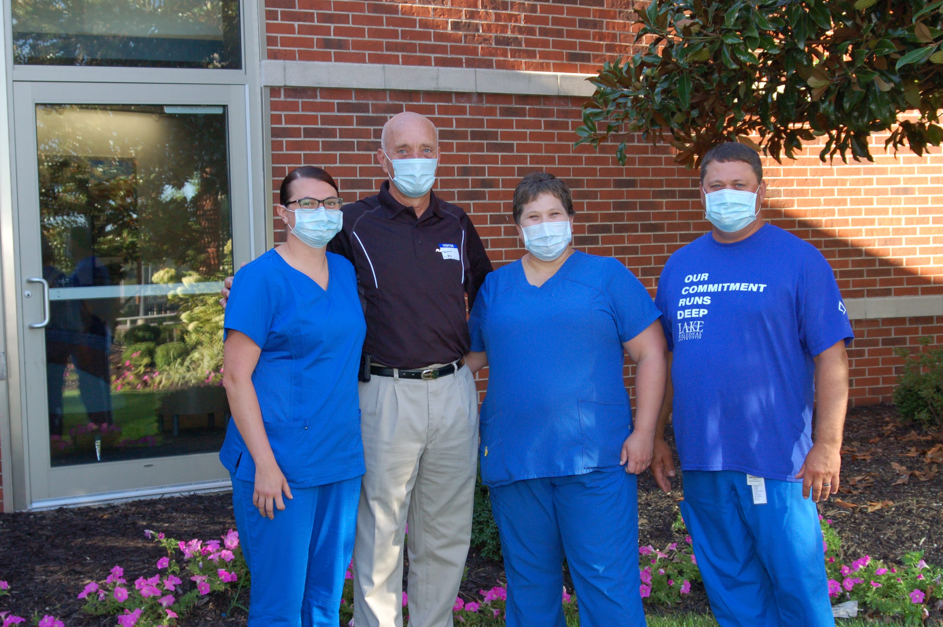 Jon Wiebe with members of his Lake Regional care team
