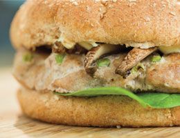 A turkey burger with mushrooms