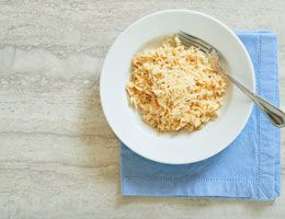 Parmesan rice and pasta pilaf in a bowl.