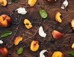 Peach, basil, fresh mozzarella, drizzled with olive oil and vinegar.