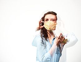 Superimposed images of a woman putting on a face mask.