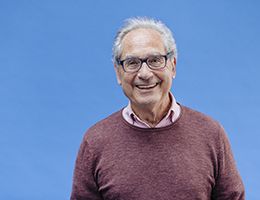 A smiling older man.
