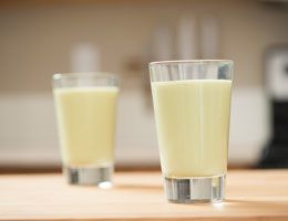 Avocado melon breakfast smoothie in two glasses