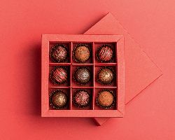 A gift box of chocolate truffles.