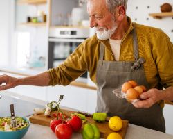 A man cooking dinner.