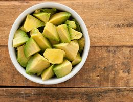 Bowl of diced avocado.