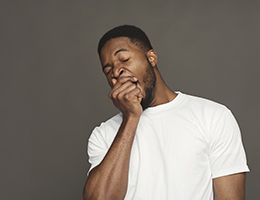 A man yawning.