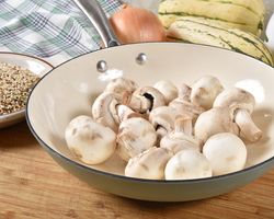 A pan holding mushrooms.