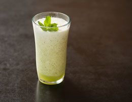 Minted honeydew cooler in a tall glass