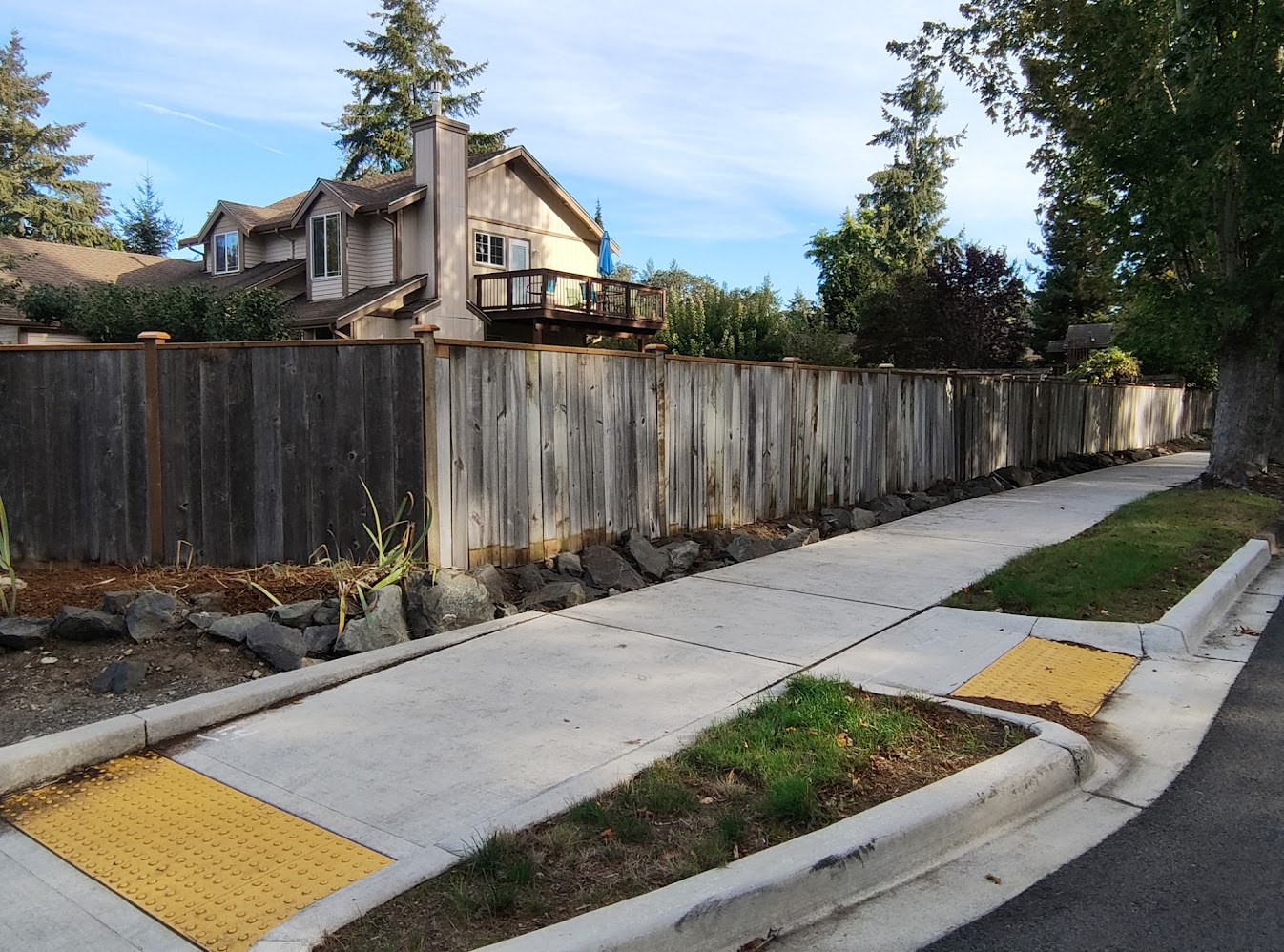 curbside view of remodeled fence
