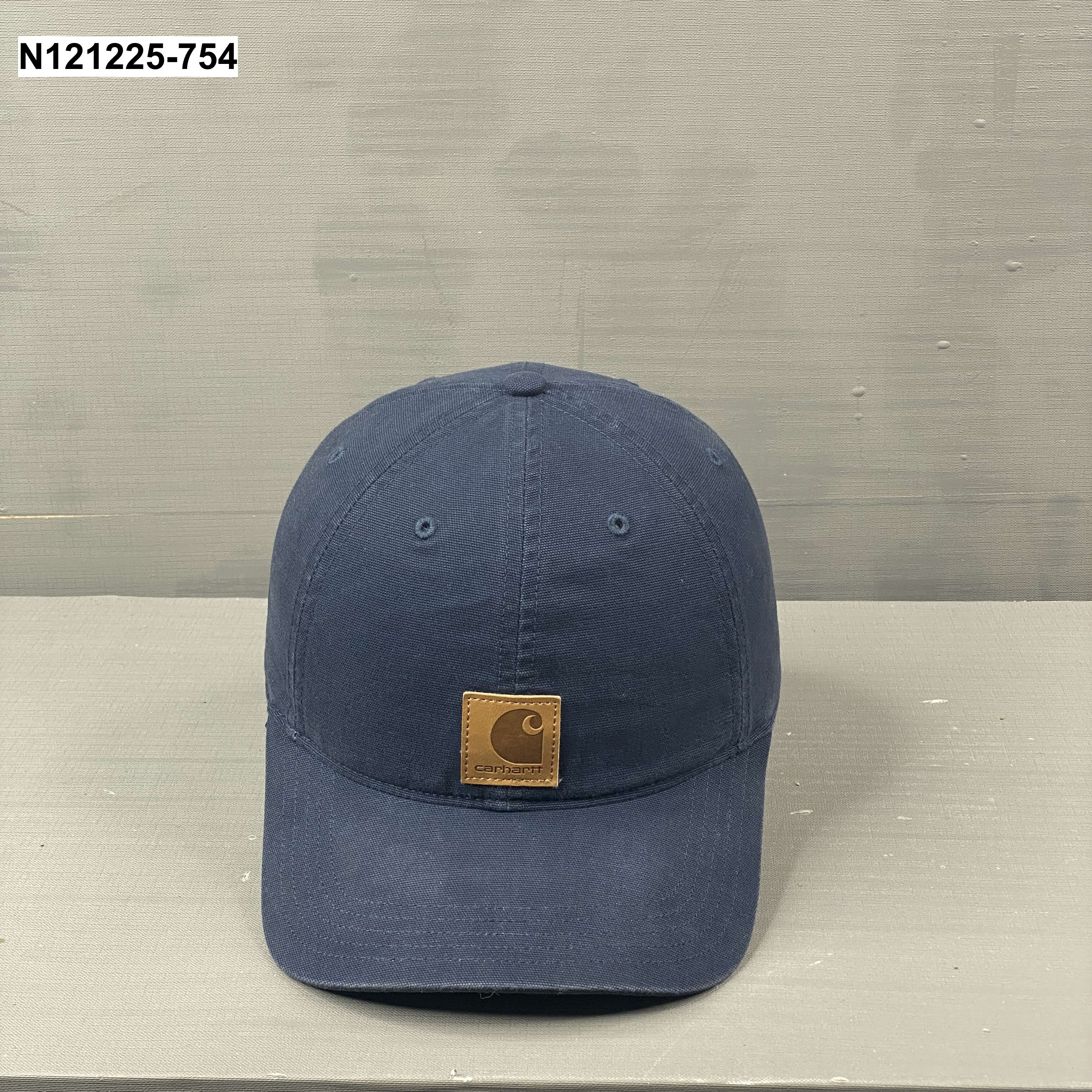 Carhartt Odessa Cap in a navy blue color.