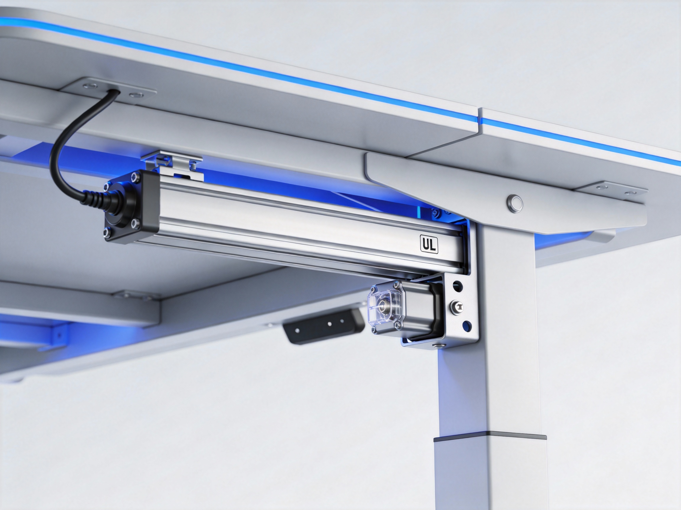 A linear actuator installed in a modern office desk with UL certification mark visible on the component