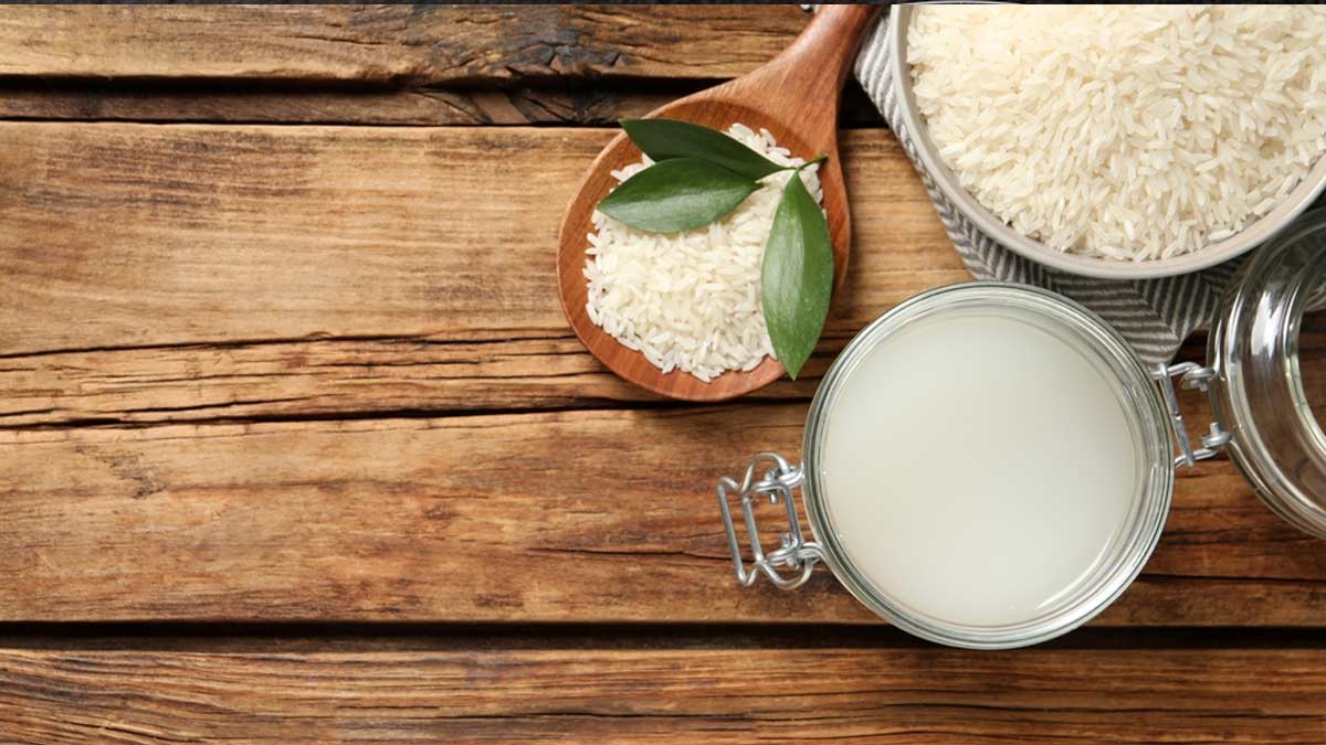 A womans waist with a measuring tape illustrates the Rice-Zempic craze, showing how rice water aids weight loss.