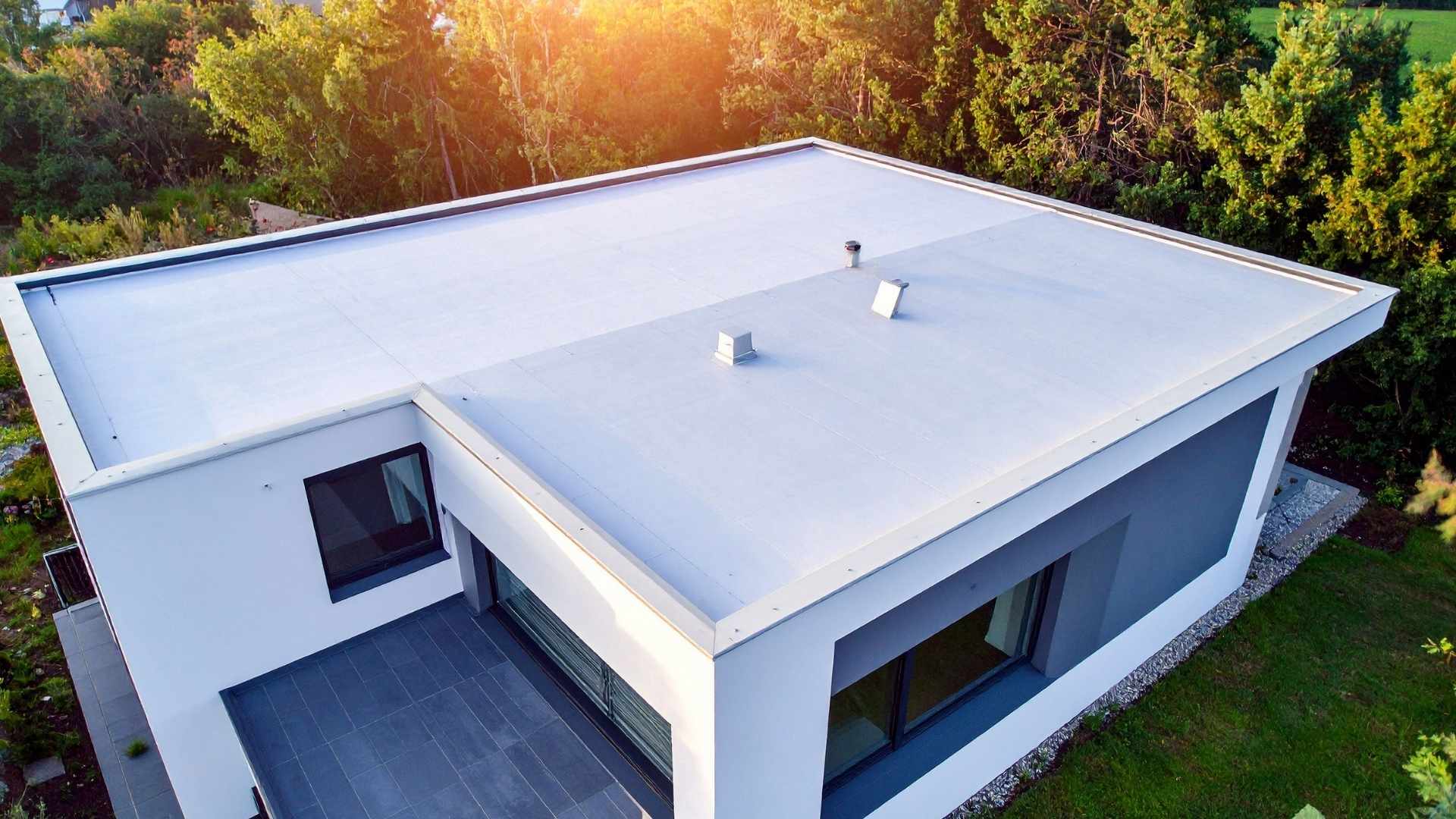 Technician working on flat roof system