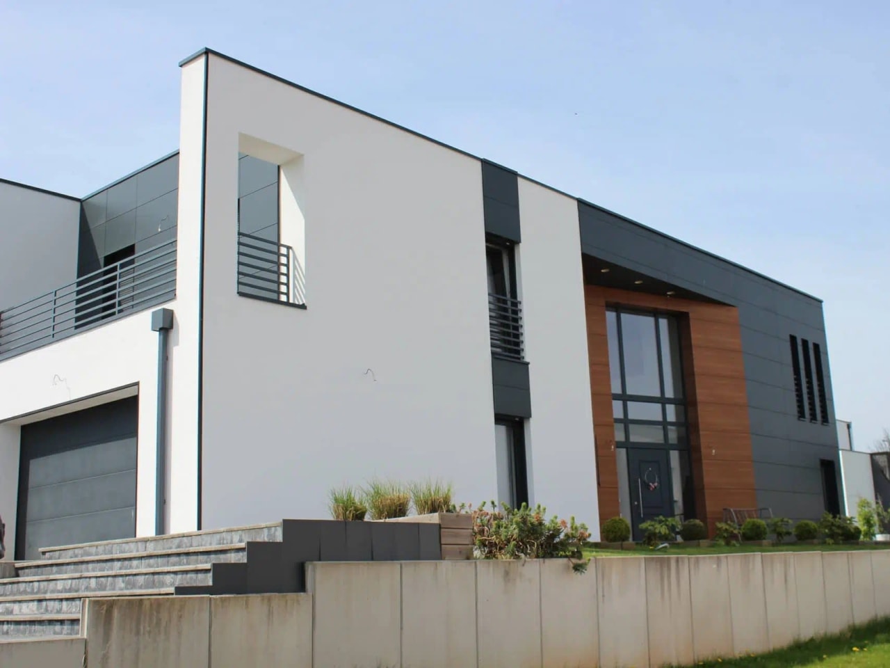 Construction neuve : maison contemporaine façade enduite