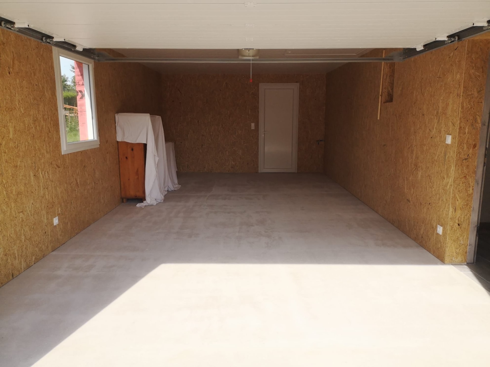 Pièce habillée en panneaux OSB