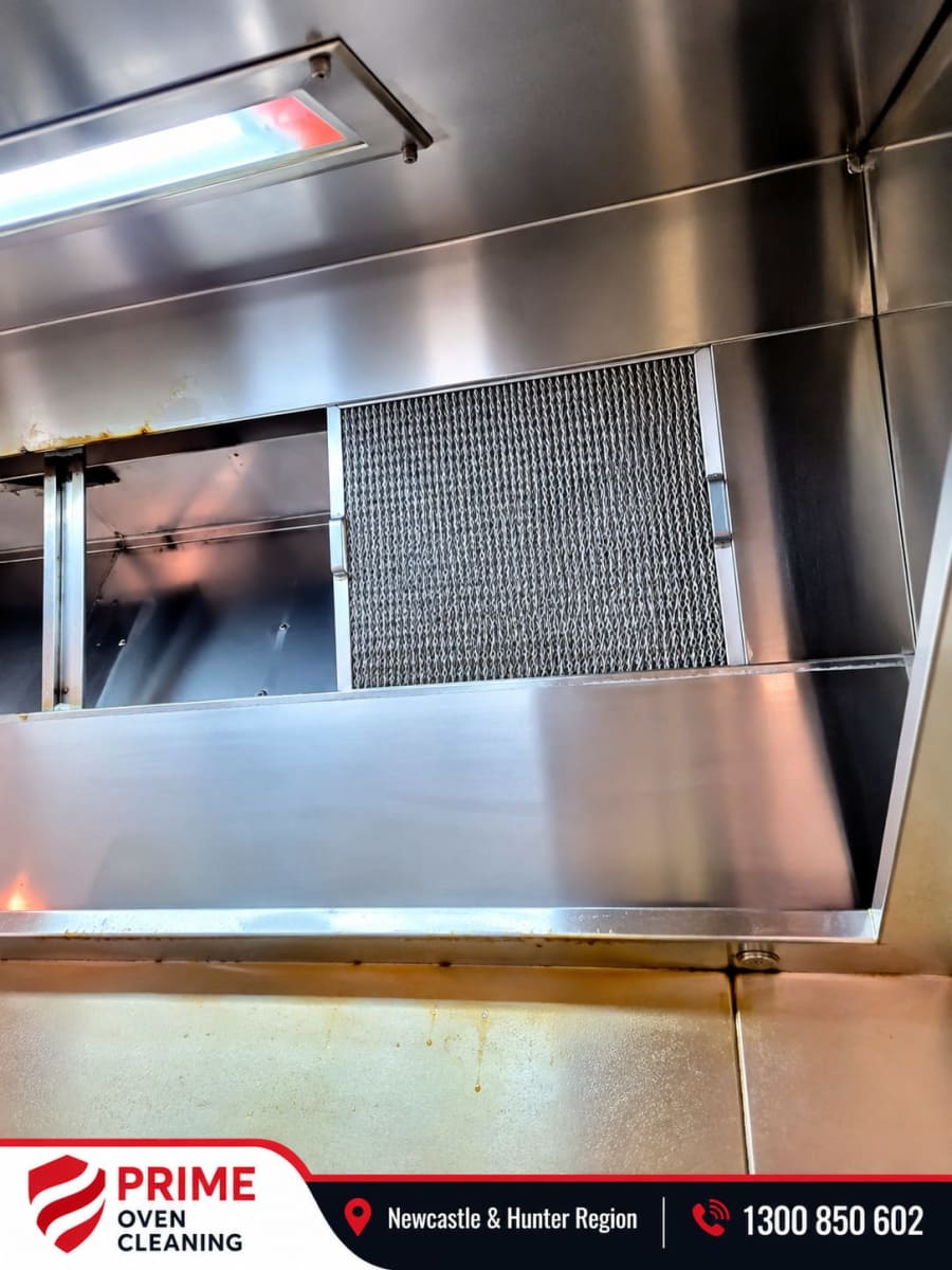Clean commercial range hood close-up