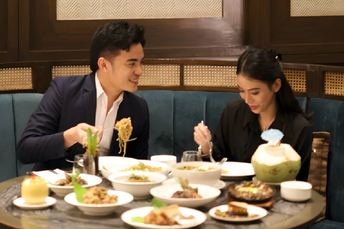 Photo of a couple dining at a fine-dining restaurant