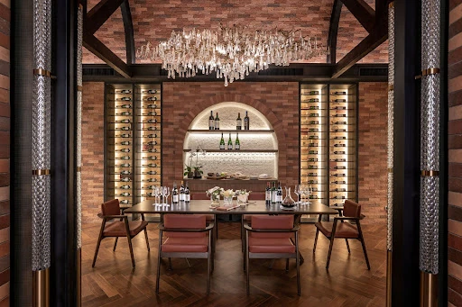 A wine cellar featuring a chandelier