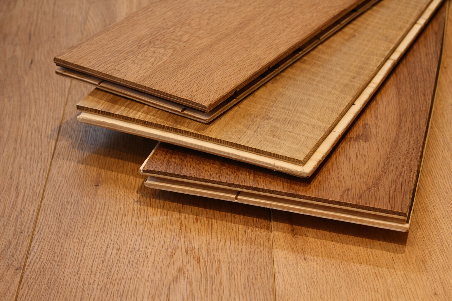 Stack of Quick-Step engineered wood planks