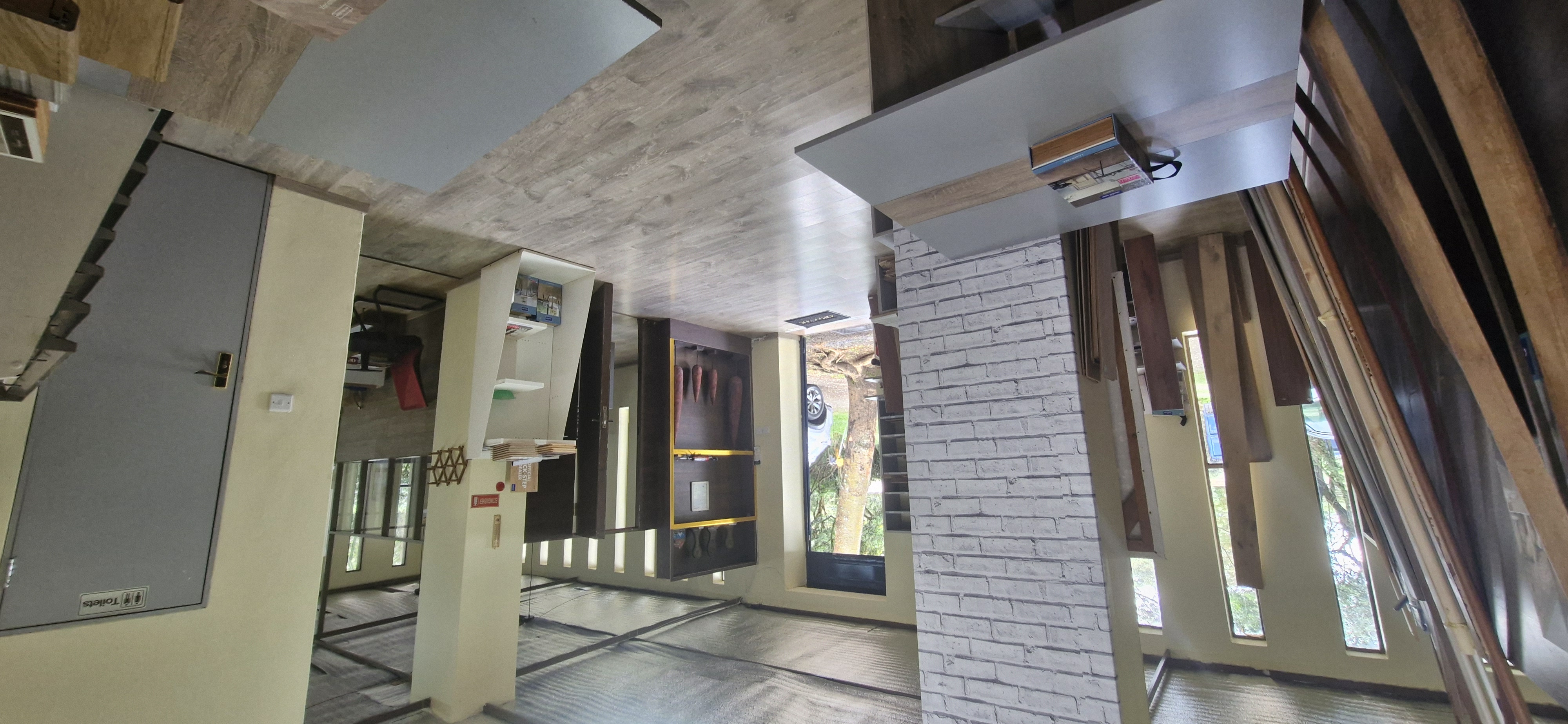 Decomagna Karen flooring showroom before upgrade view towards exit door