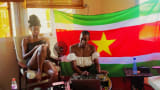playing songs at my grandma's house in Suriname