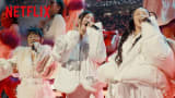 EJAE, AUDREY NUNA, and REI AMI perform during Snoop’s Holiday Halftime Party | Netflix