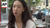Fight breaks out behind Harvard graduate as she reflects on recent divisions