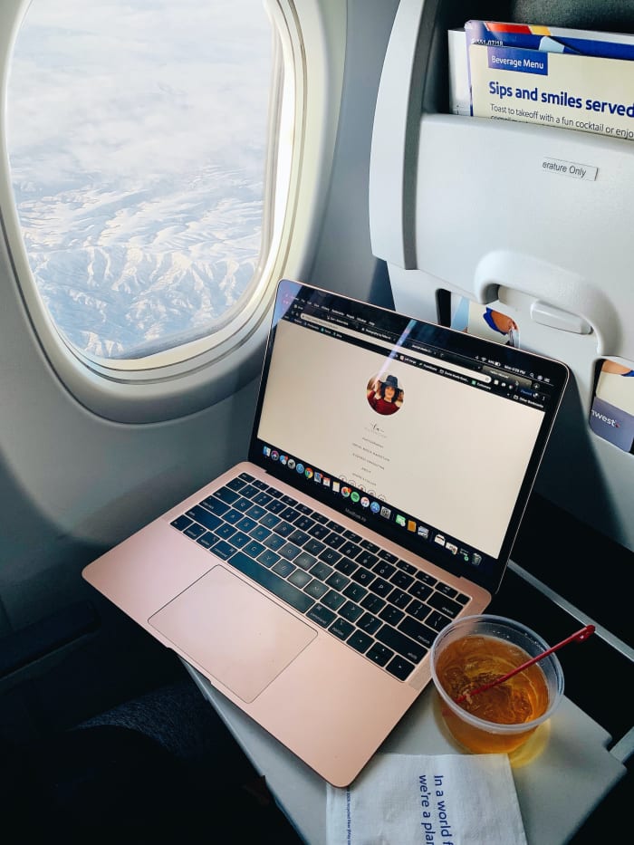 a laptop with internet access inside a airplane