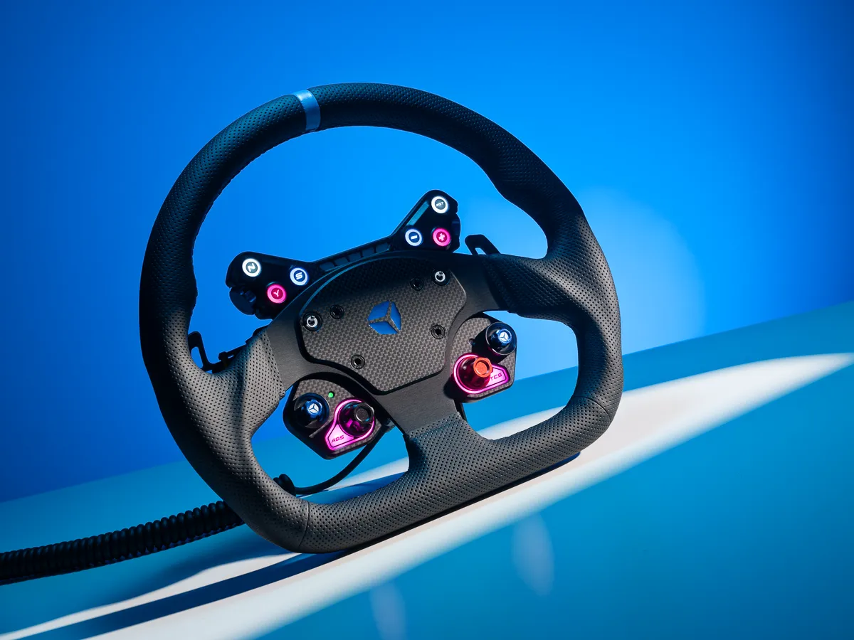 sim racing wheel on a blue background