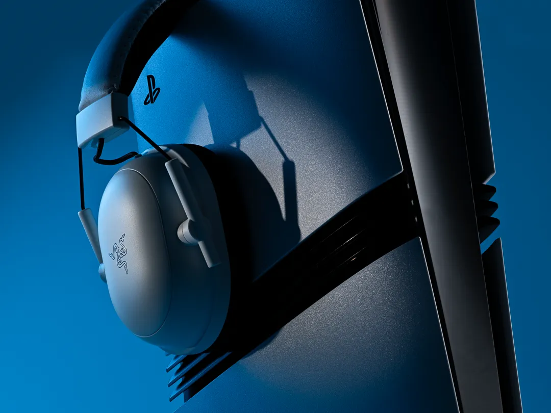 Close of of Razer Blackshark V2 headphones sitting on a PlayStation 5 Pro