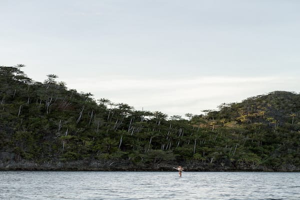 Dunia Baru's 7-Day Raja Ampat - Day One - Guest Enjoy Stand-up Paddle Board