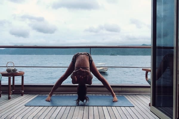 Kudanil Explorer's 8-Day Surf Papua - Day 4 - Guests practising Yoga