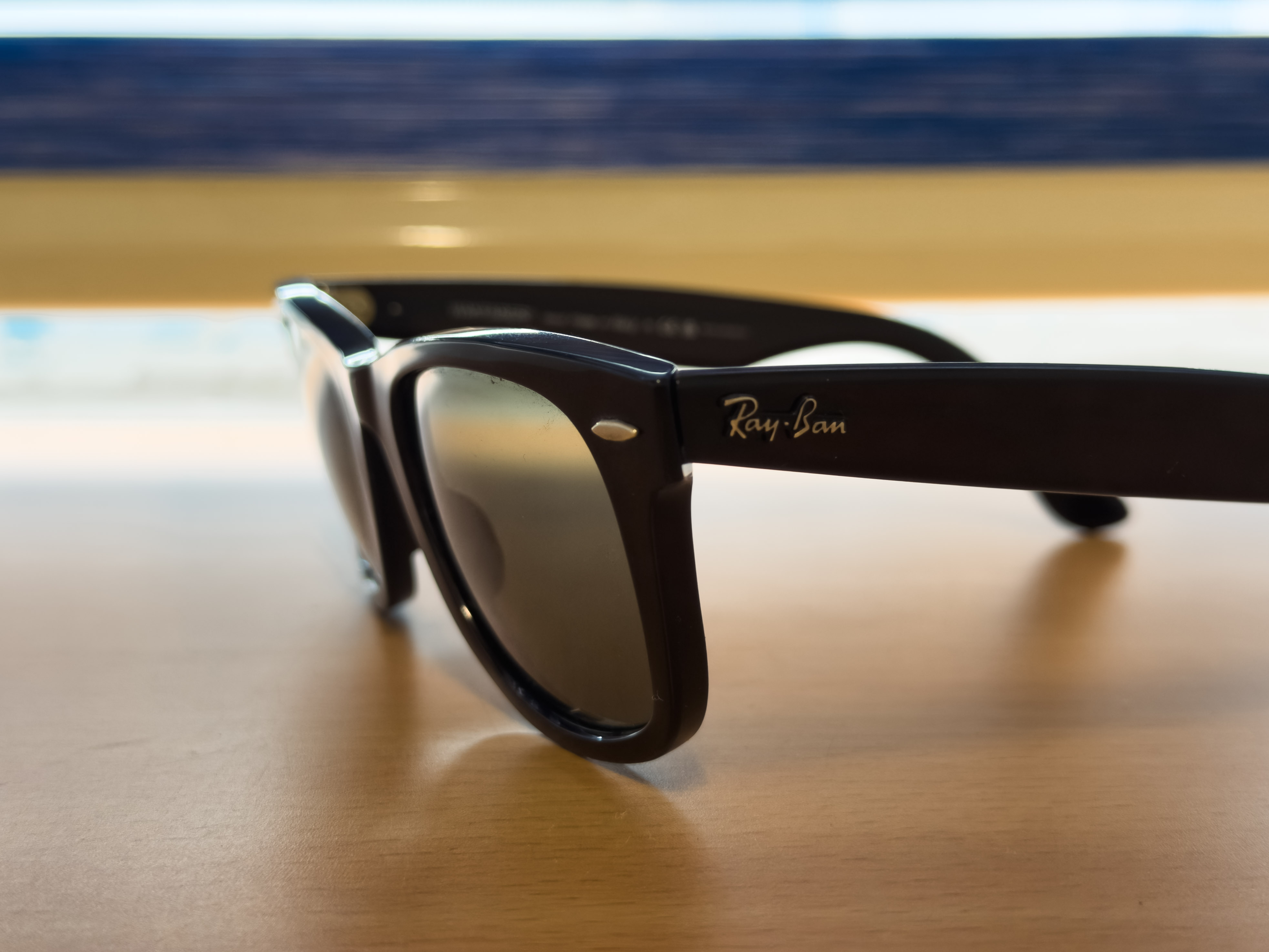 Ray-Ban Wayfarer, black frame with green lens