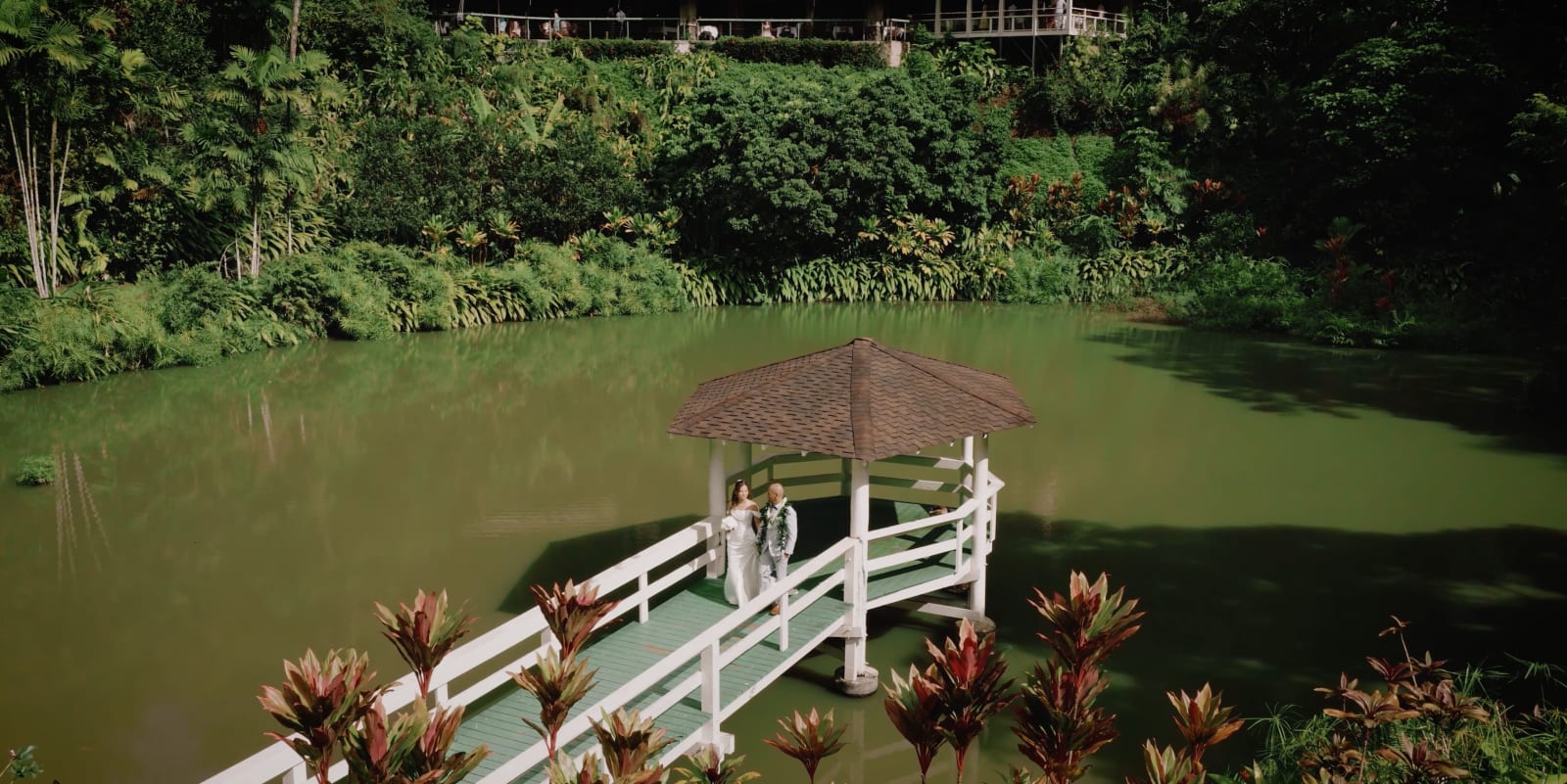Wedding couple on the bridge at Haiku Gardens