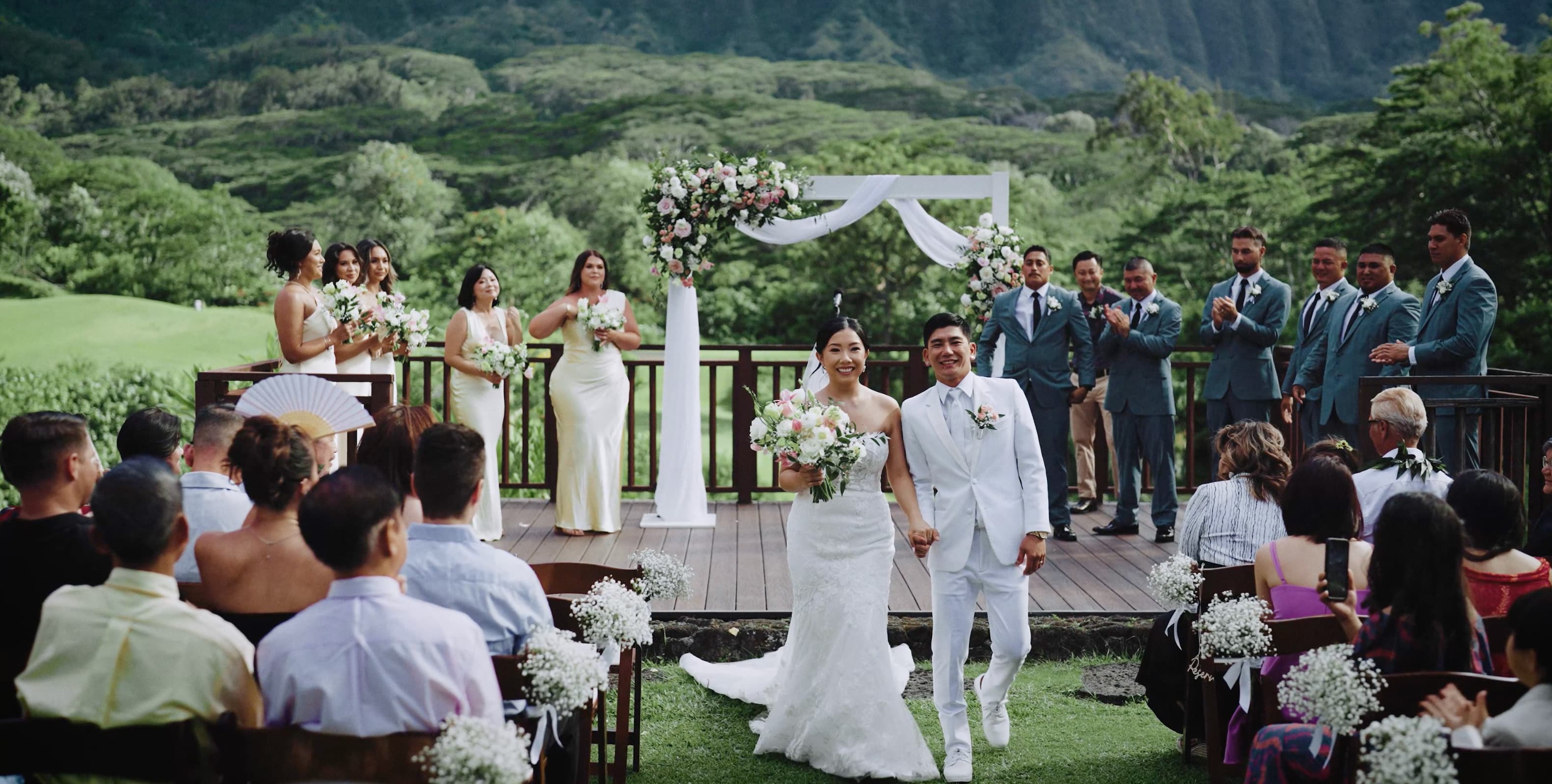 Walking down the aisle as husband and wife at The Charming Estate.