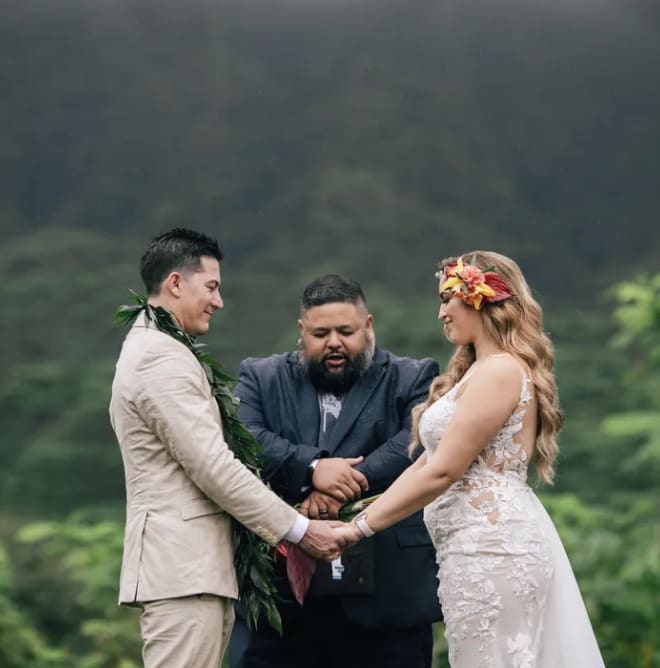 Partner Akiona performing a wedding ceremony