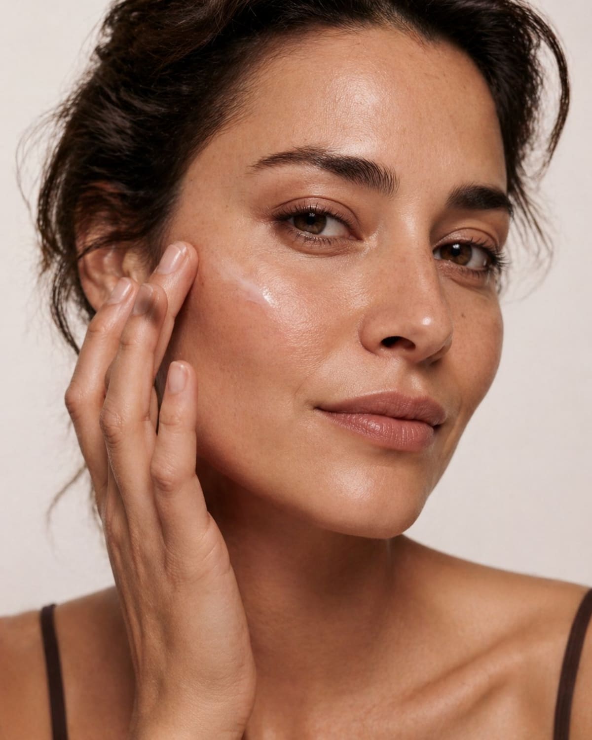 Active Suncream on olive skin tone — type III