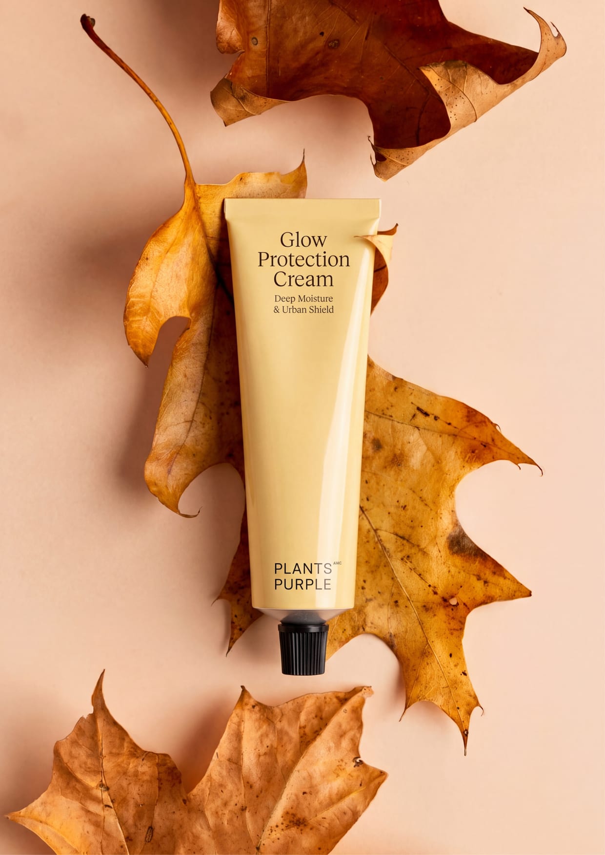 Glow Protection Cream on golden autumn leaves